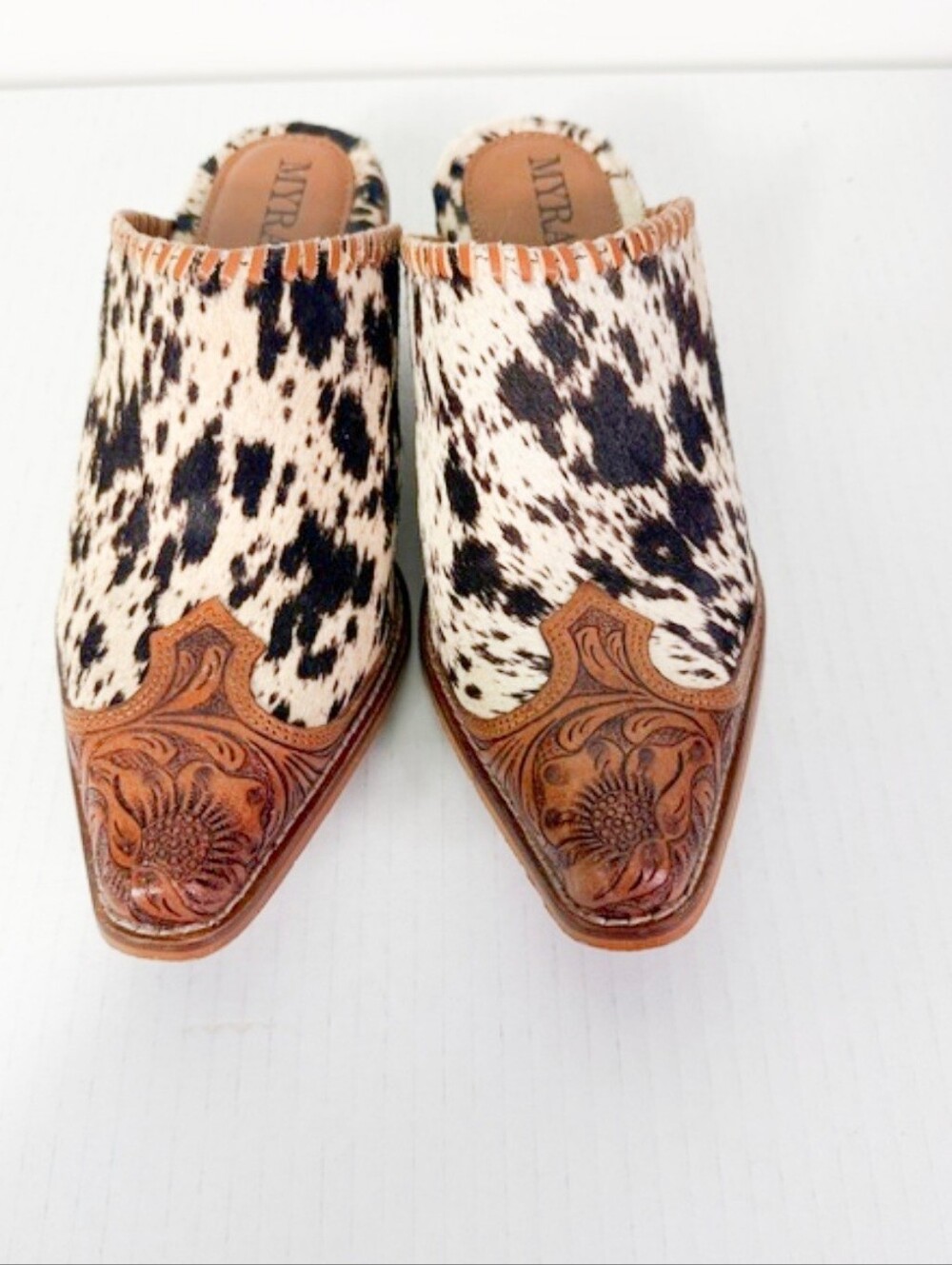 Trending Cowhide Pattern Slip-On Myra Mule in Black and Cream - Picture 2 of 8